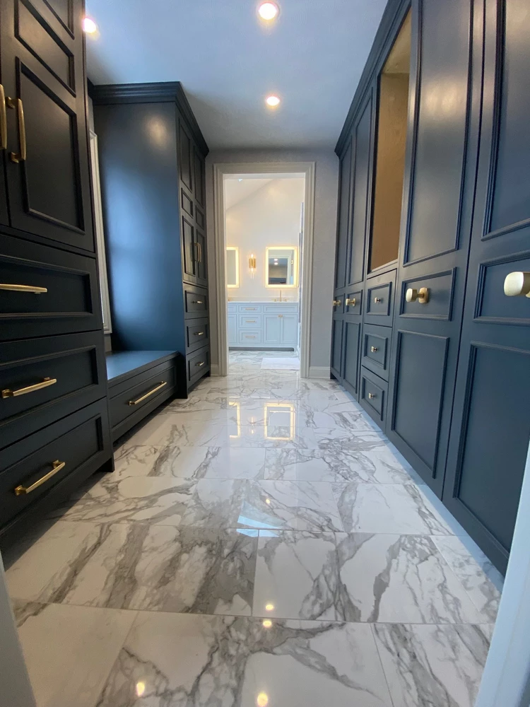 Custom-built bathroom cabinets installed during remodel