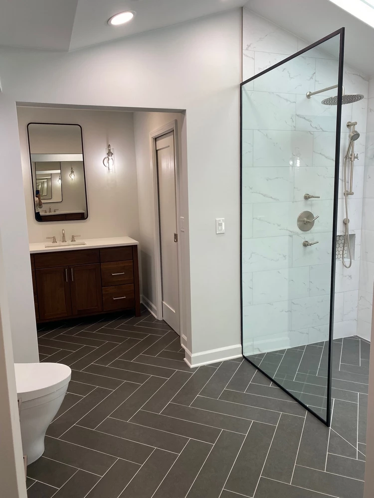 Master bathroom renovation with walk-in shower and custom tile work