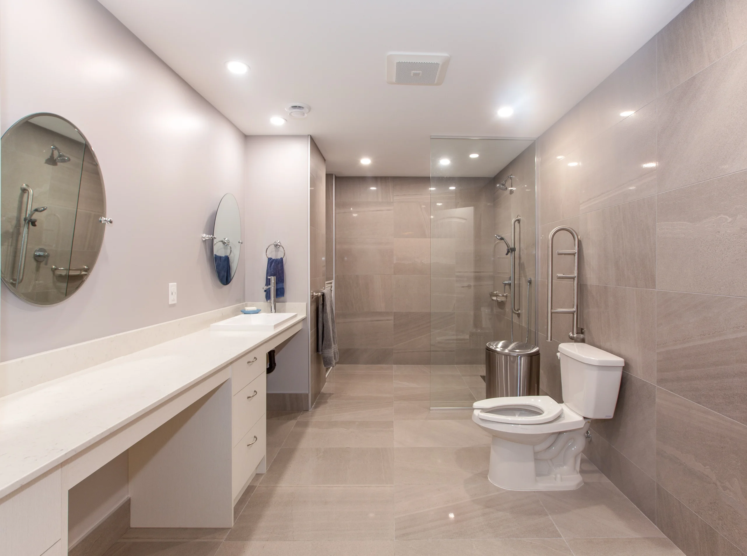 Elegant bathroom remodel featuring double-sink cabinets